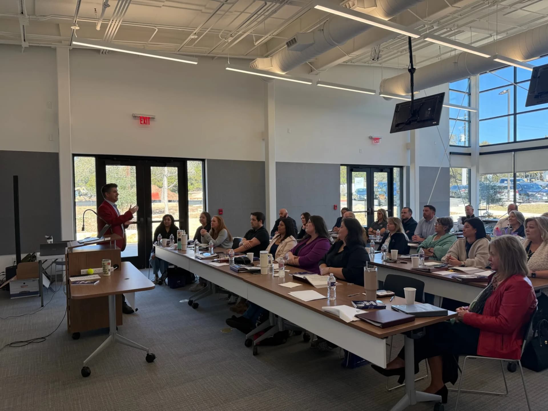 Dagan Martinez-Vargas presenting to a room of business networkers