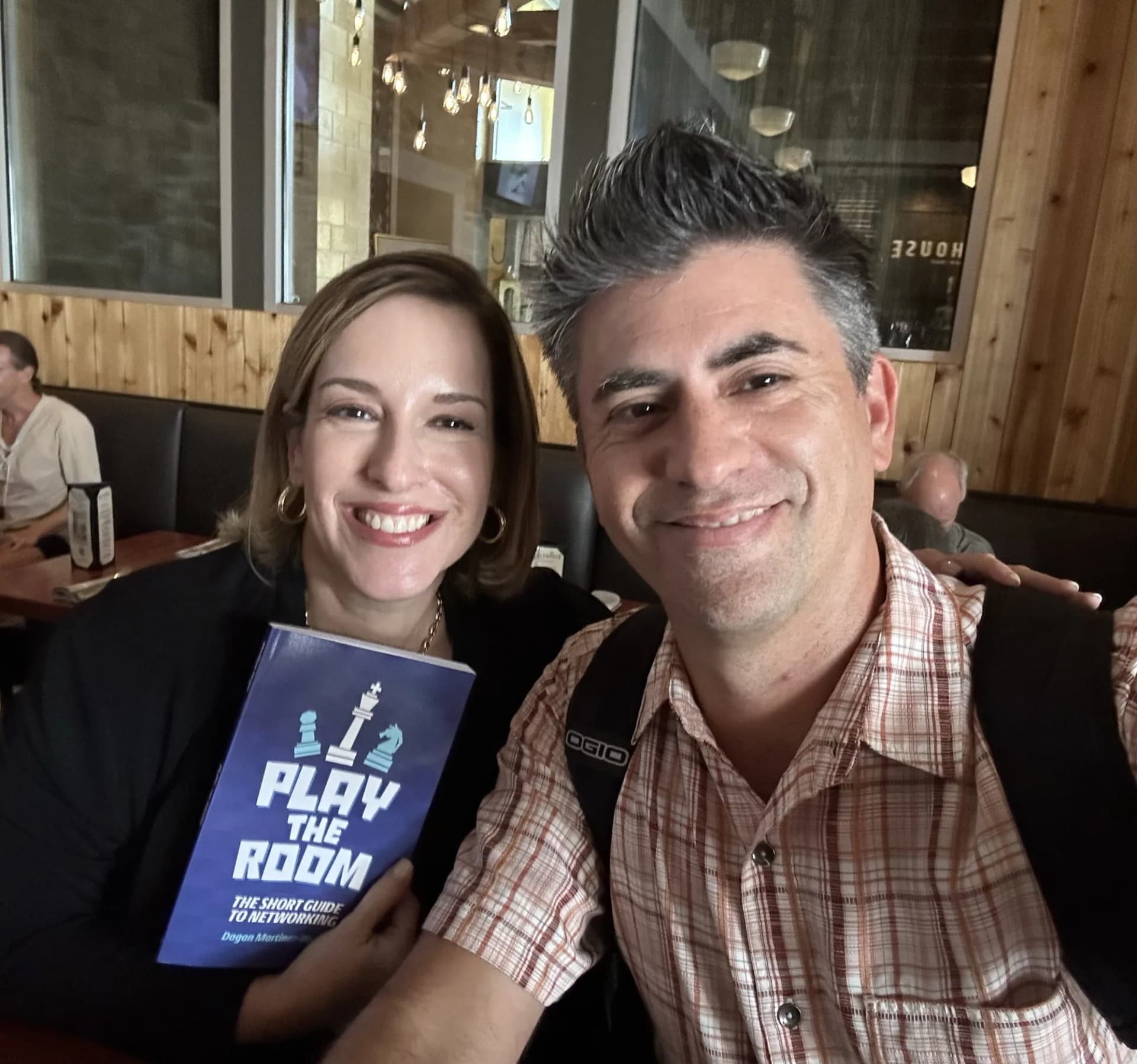 Dagan with a reader at a chamber event